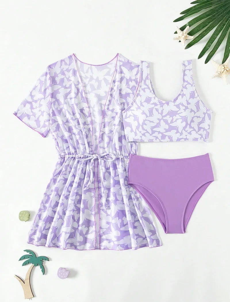 Girls three piece polyester swimsuit set comprising a coat, vest, and pants in colour 3218