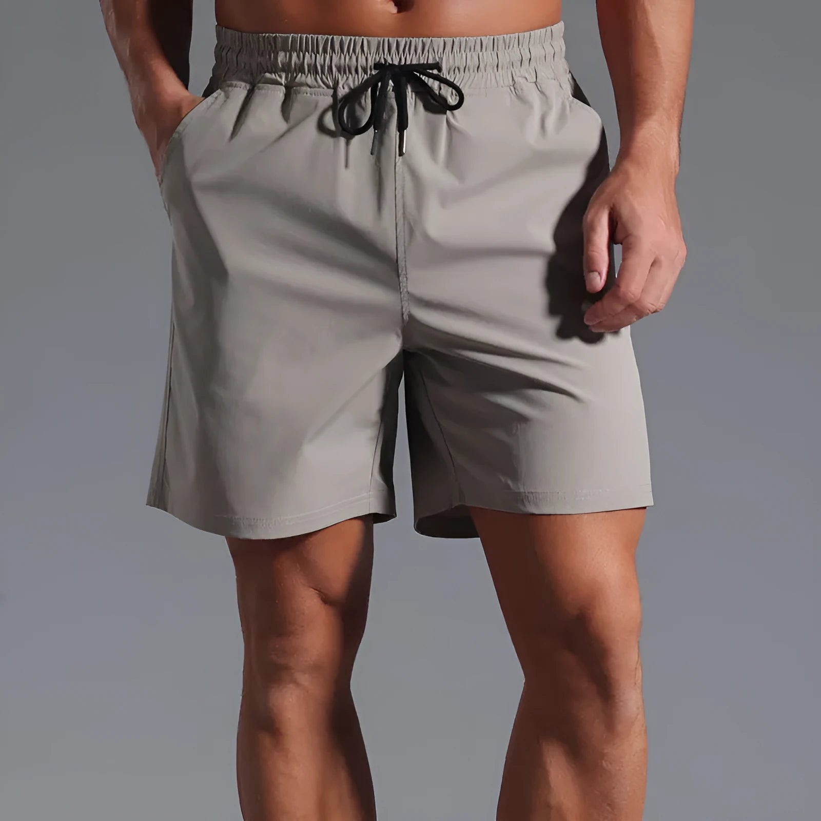 A pair of men's loose-fit casual shorts in a straight cut style, shown in one of the available colours.