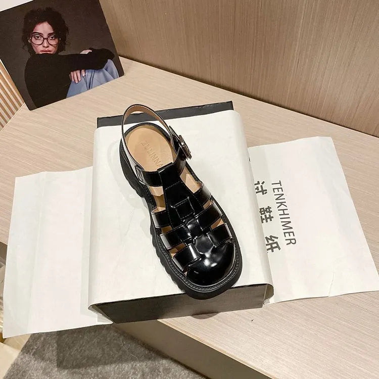 Women's beige retro platform sandals with chunky rubber sole and buckle closure.