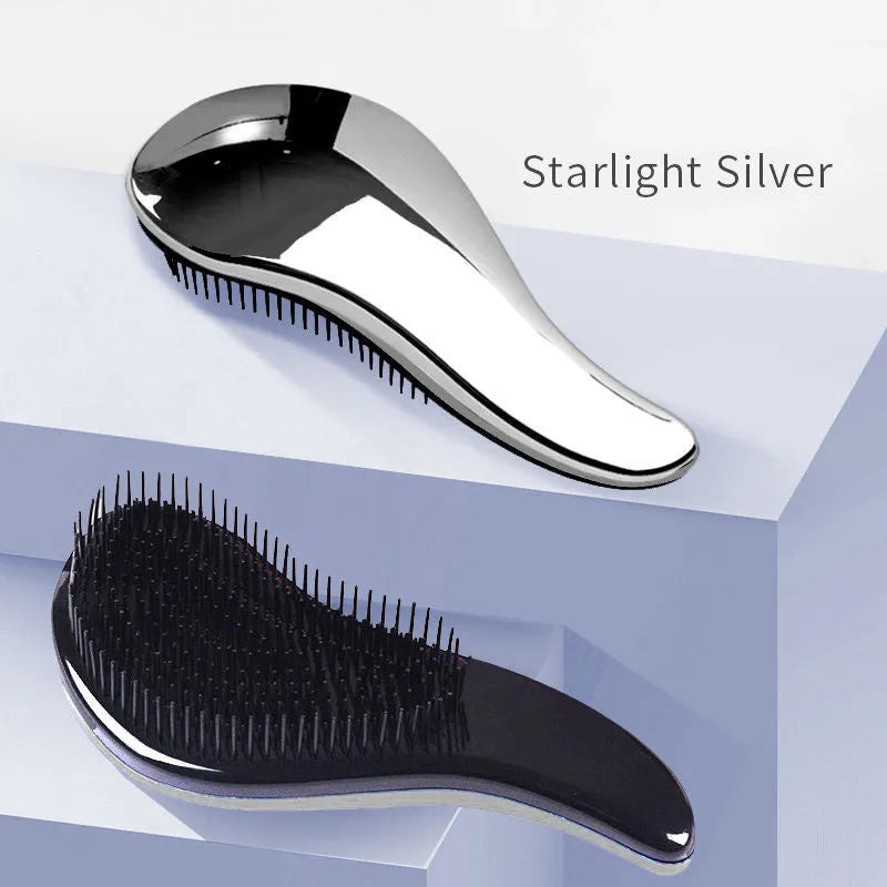2-in-1 dog grooming comb and massage brush with floating design in Blue colour on a wet surface