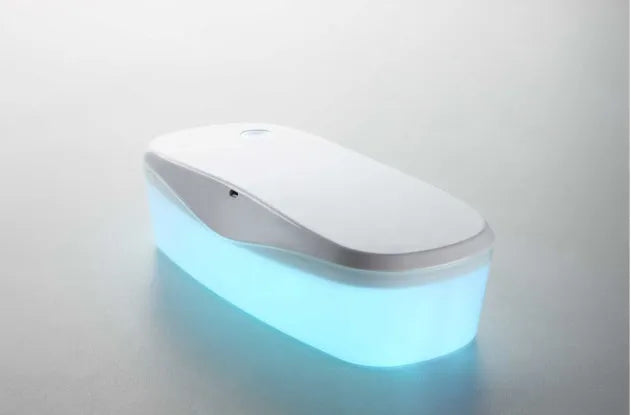 Compact white DORR UV disinfection box with USB cable for sanitising phones and small items.
