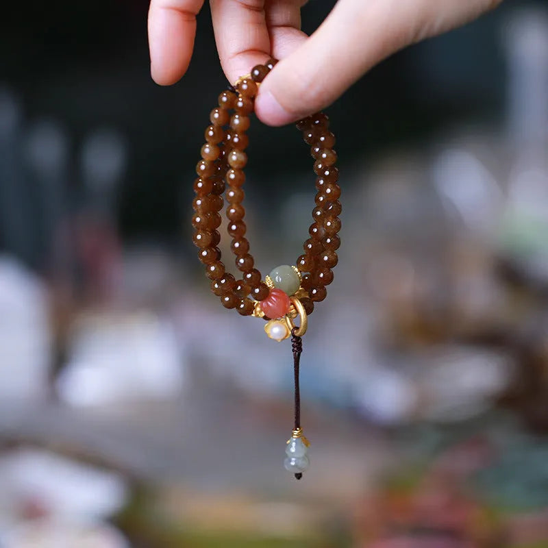 Brown jade Hetian jade three-ring bracelet with silver plated accessories, butterfly and gourd pearl motifs