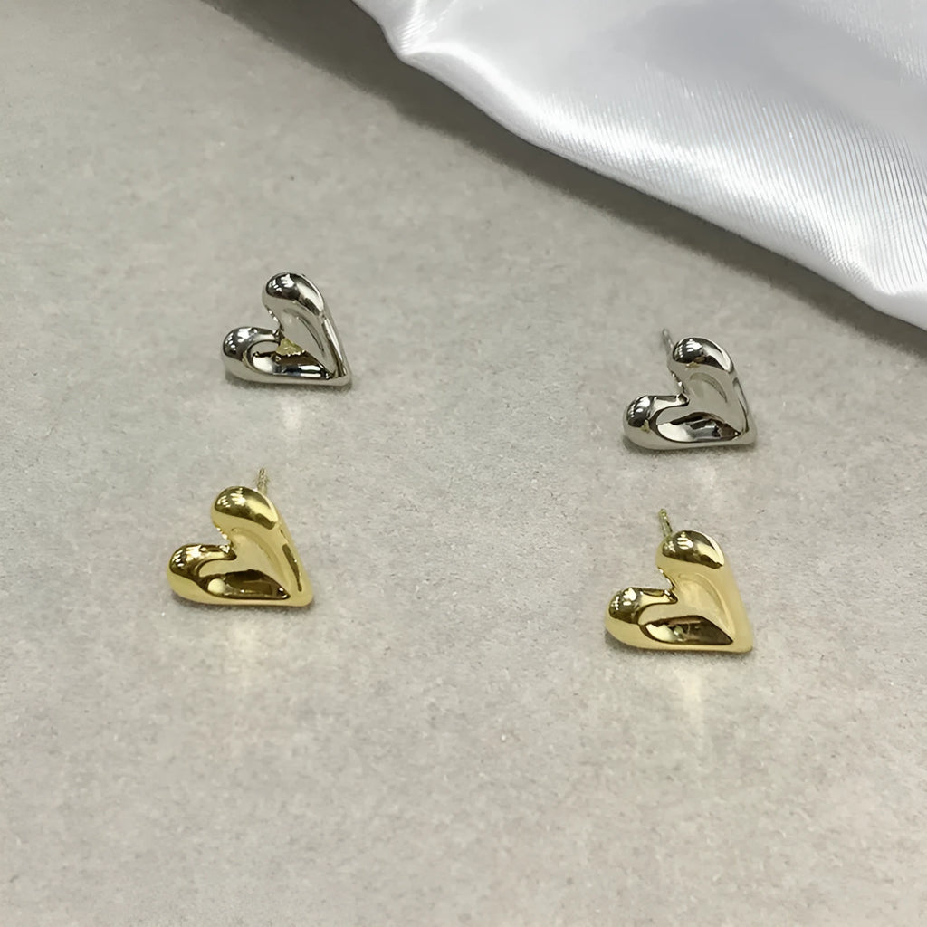 Simple heart-shaped metal drop earrings in gold and silvery colour options