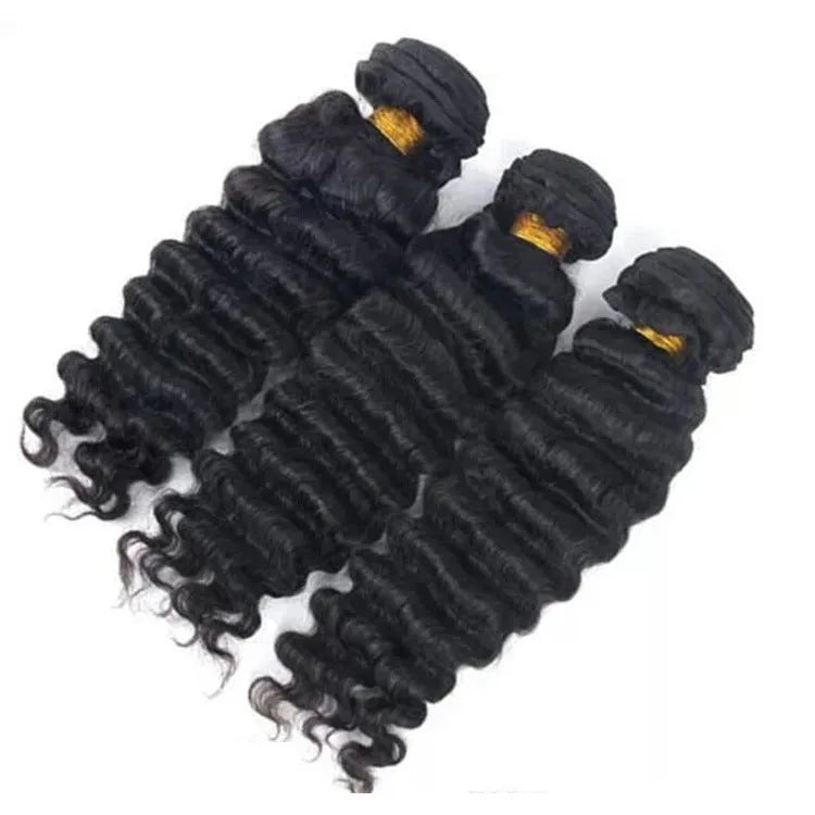 Real hair wig with natural curls in medium long length shown on a mannequin head