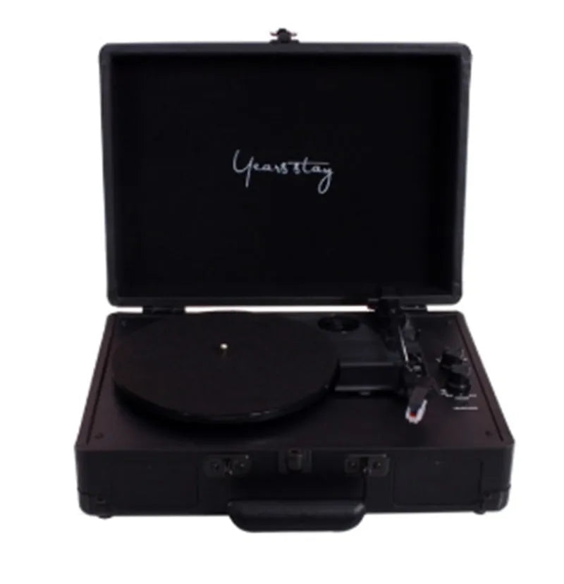 Leather-cased portable Bluetooth turntable for vinyl and film records in multiple colours.
