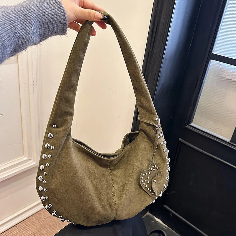 Women's soft plush strapless tote handbag in a retro style, shown in one of five available colours.