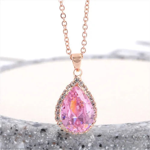 Women's drop-shaped pendant necklace with rhinestone geometric pattern in pink electroplated finish