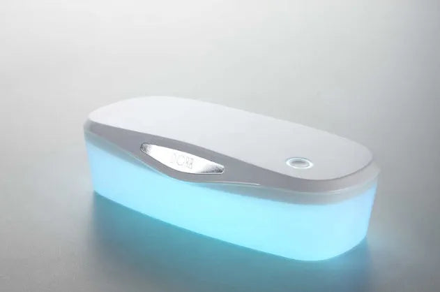 Compact white DORR UV disinfection box with USB cable for sanitising phones and small items.