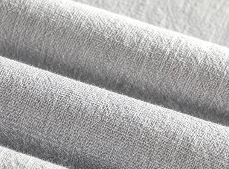 Men's loose fit linen shirt in a solid colour, shown in a light grey option.