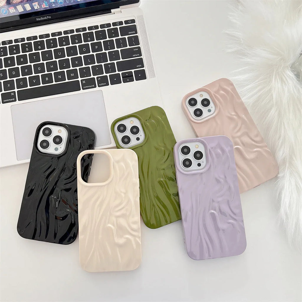 Ins style solid colour water ripple silicone phone case for iPhone models on a plain background.