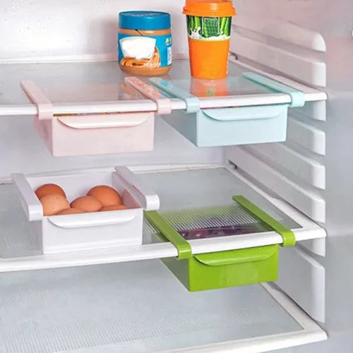 Hanging plastic refrigerator storage rack with drawer compartments and clapboard design for kitchen organisation