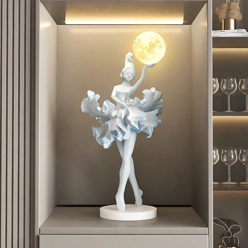 Ballet dancer resin night lamp in pink placed on a hallway table