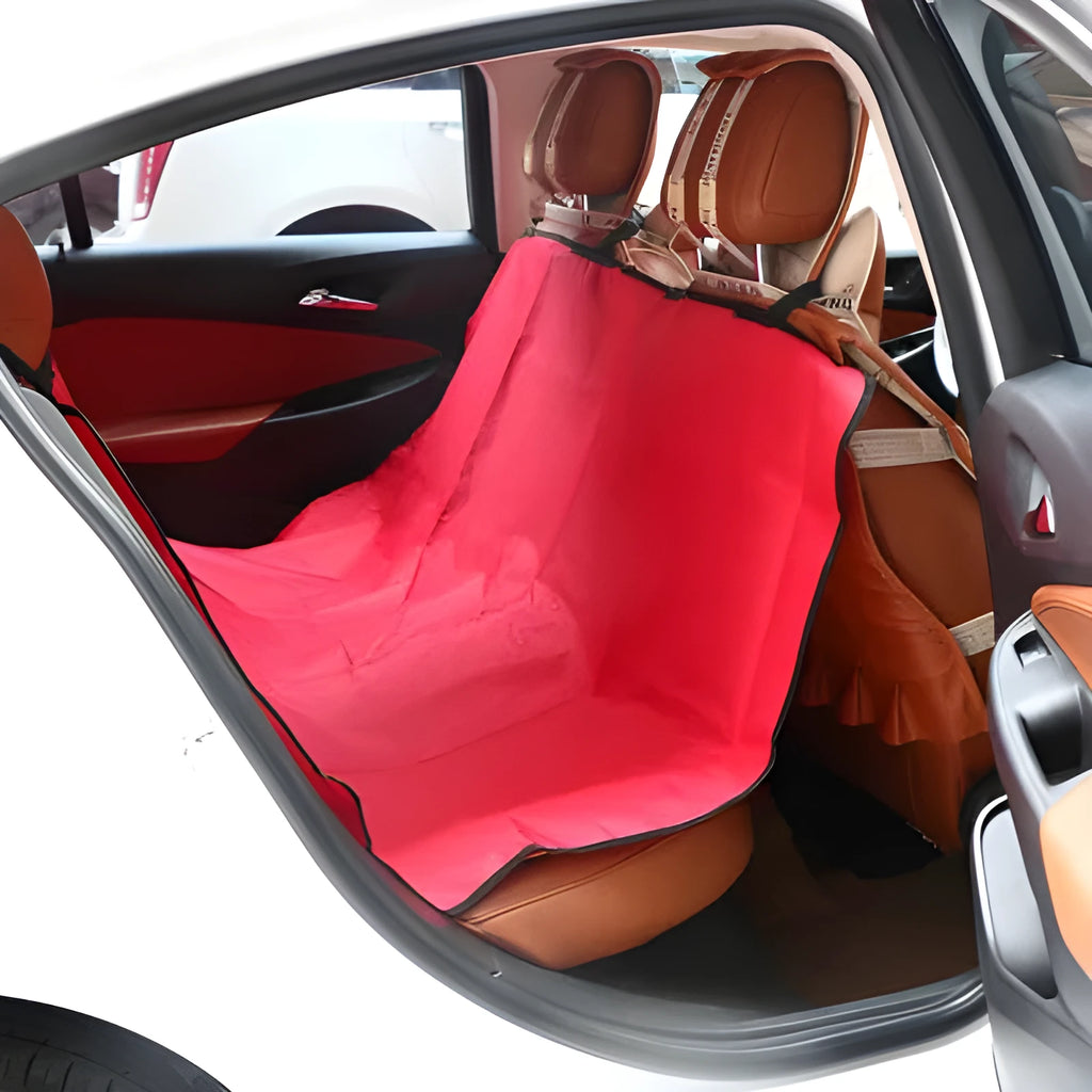 A square black car pet pad for dogs and cats on a vehicle seat.