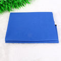 A square black car pet pad for dogs and cats on a vehicle seat.