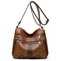 Brown PU leather messenger bag with multiple compartments and single shoulder strap