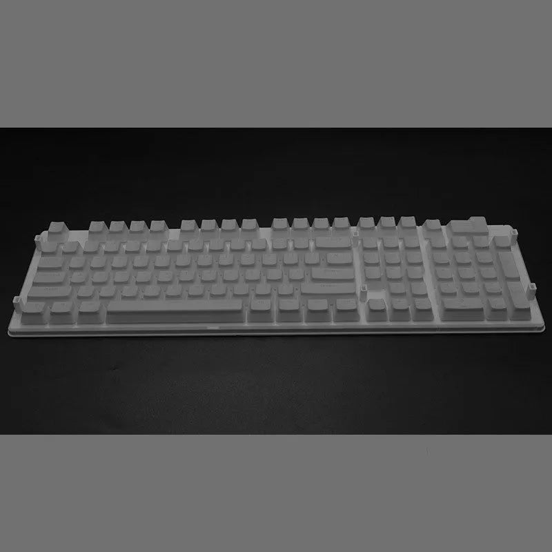 Set of 108 translucent pudding-style PBT keycaps for mechanical keyboards in assorted colours.