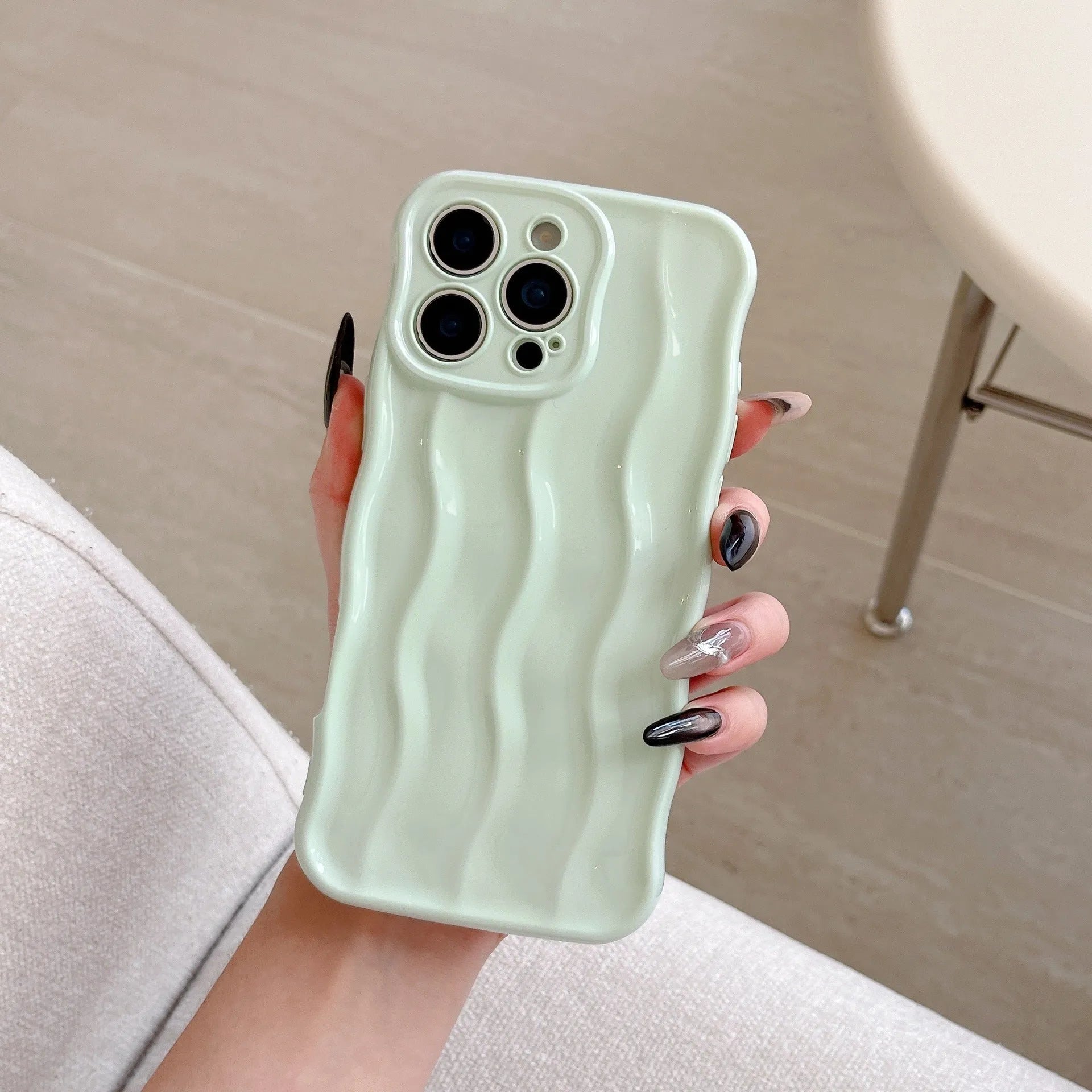 Electroplated wave stripe protective back cover case for iPhone 17 in various colours.