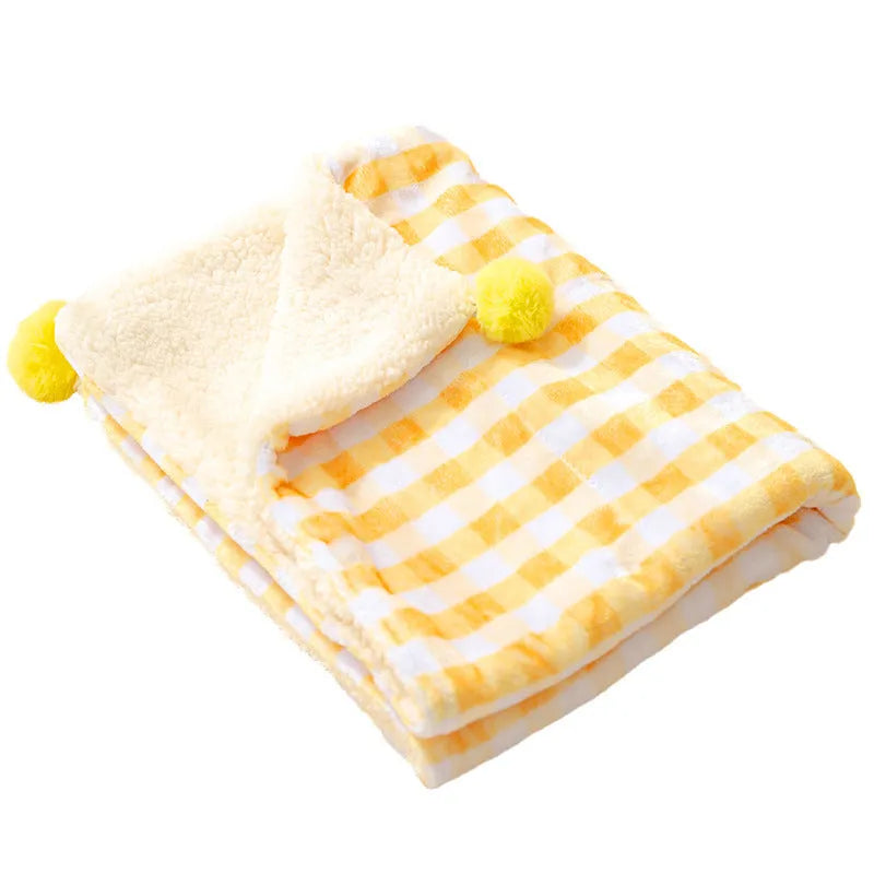 Blue coral fleece pet blanket shown laid out flat, demonstrating its soft texture and size.