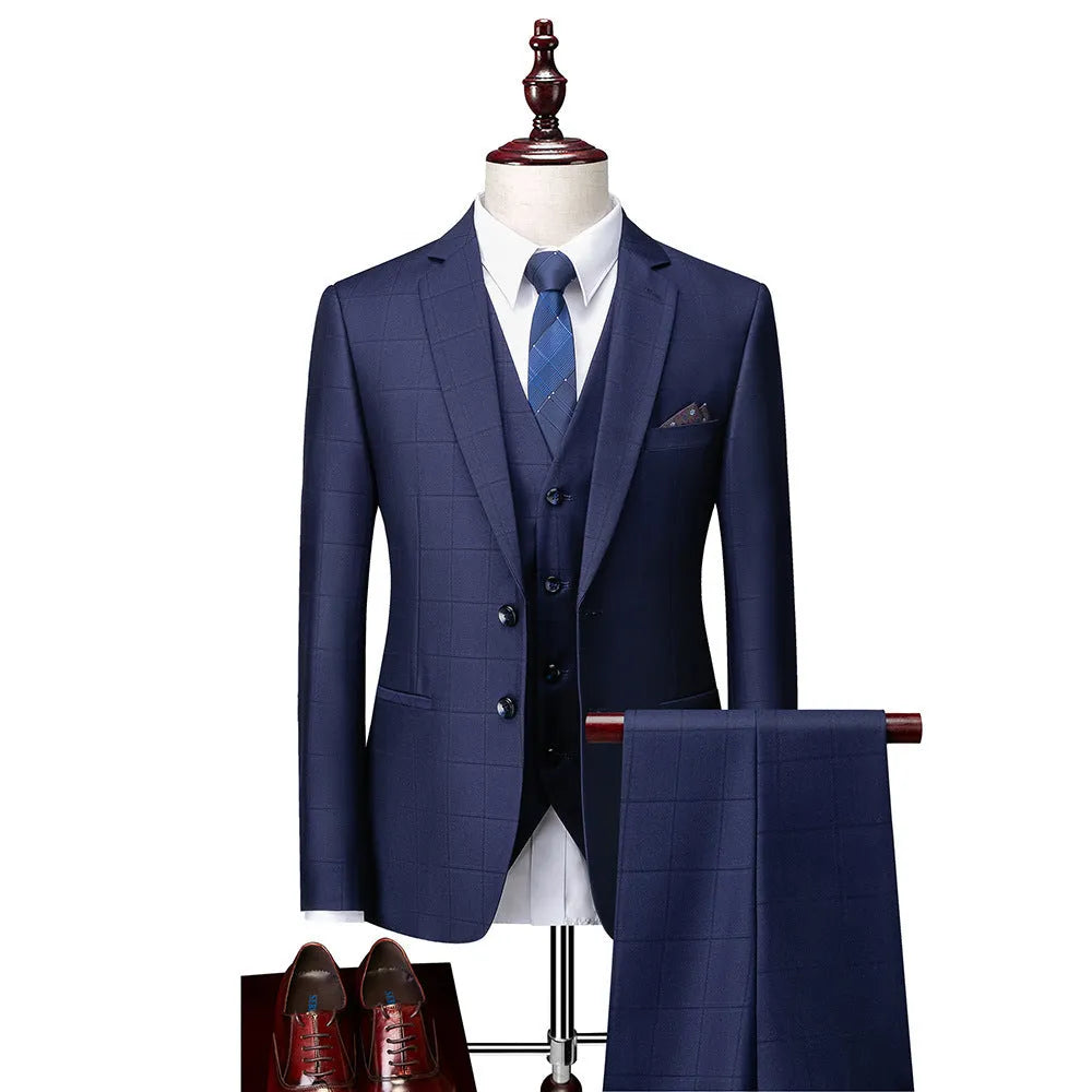 Men's navy blue plaid slim fit three-piece business casual suit with jacket, vest, and trousers