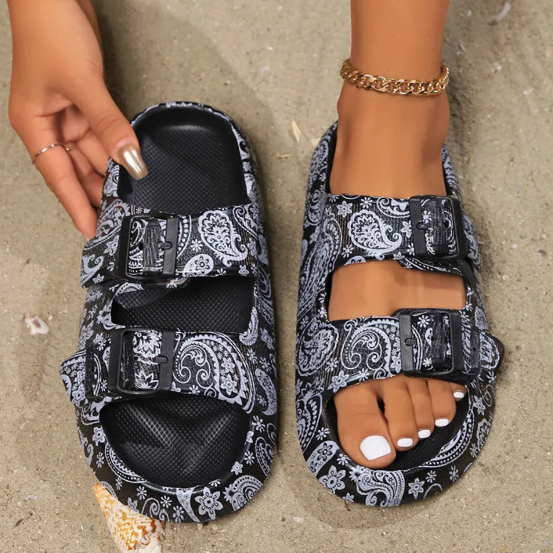 Women's black leopard print EVA foam bathroom slippers with thick non-slip sole.