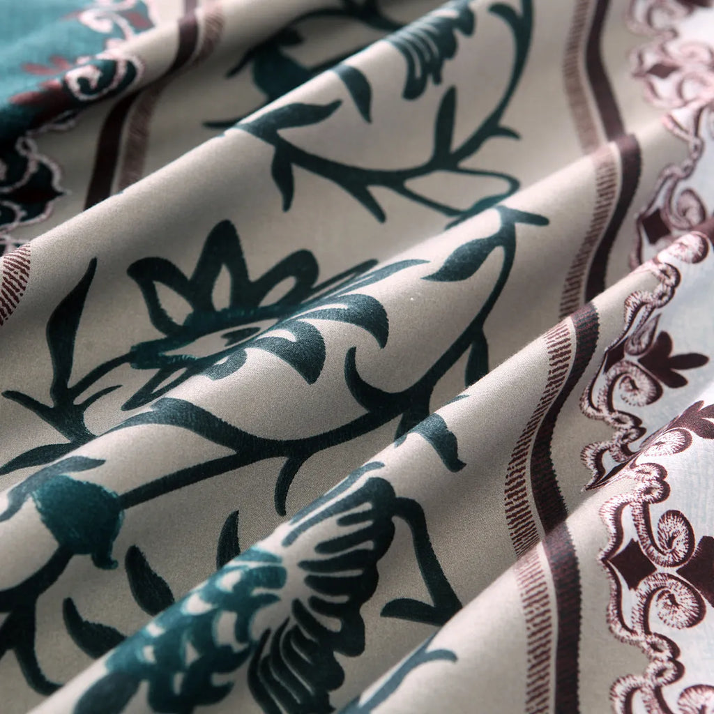 Plain weave polyester duvet cover set in solid colour or floral pattern on a bed