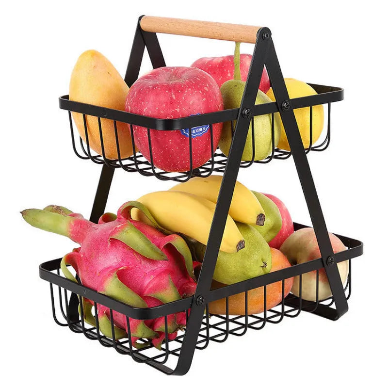 Black detachable iron double-layer fruit basket with wooden handle on tabletop