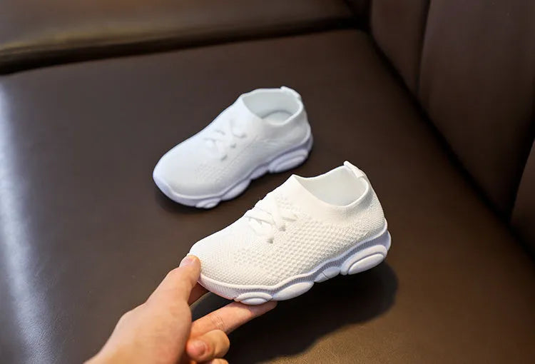 Children's fabric slip-on shoes with non-slip rubber soles in white, black, pink or grey colours