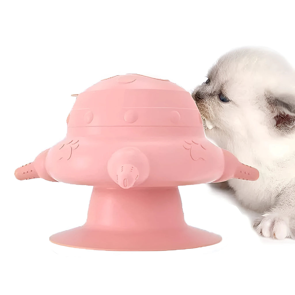 Pink silicone pet nursing bottle with bionic breast shape and four attached nipples on a flat base.