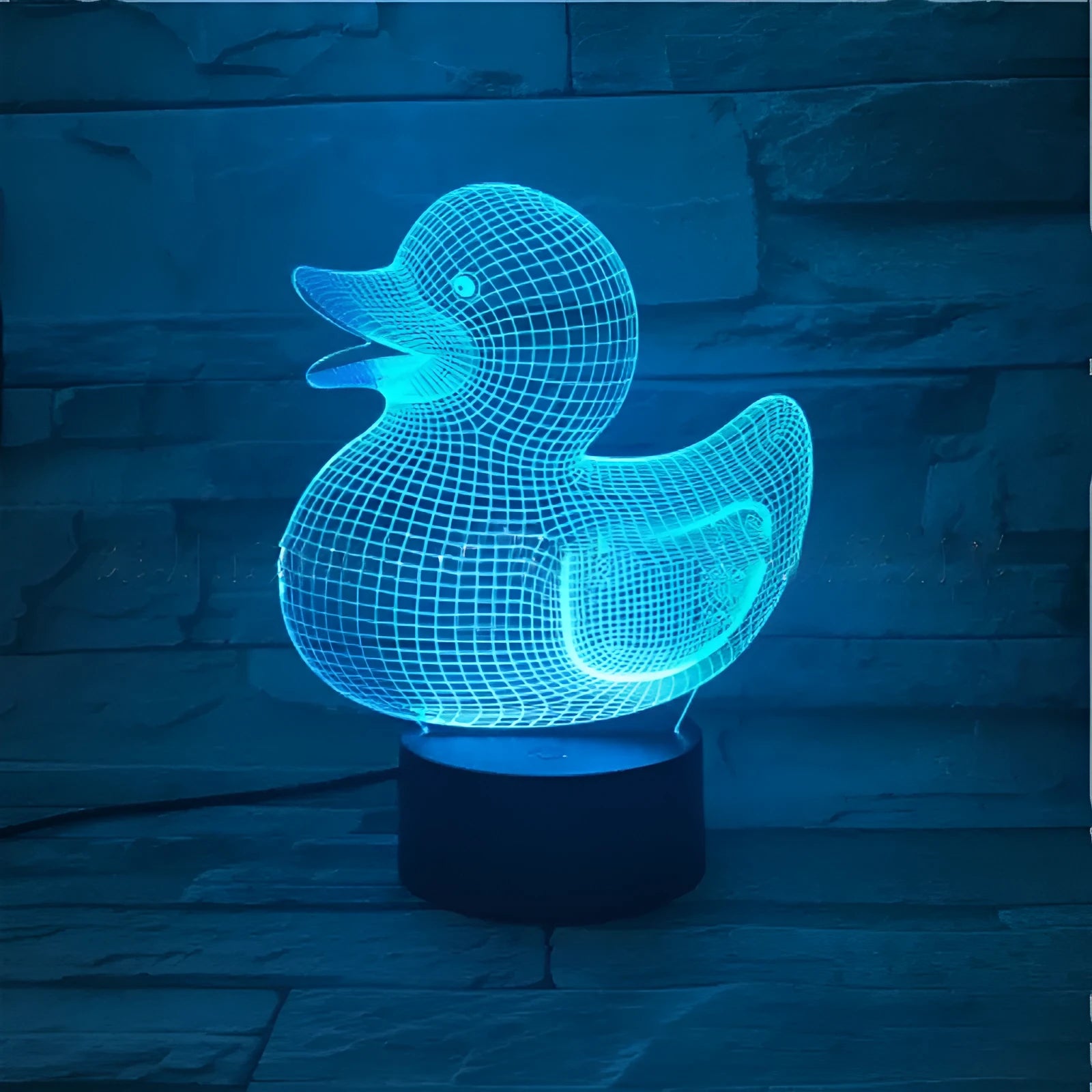 Little yellow duck 3D acrylic night light with colour-changing LED and remote control on table
