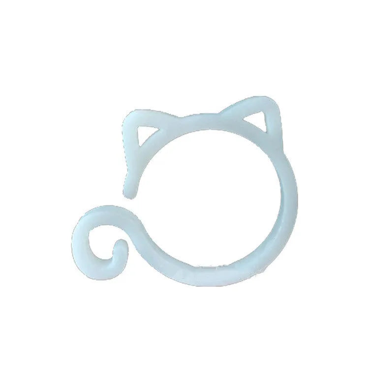 Cat-shaped plastic plant clip in gardening setting with colour options