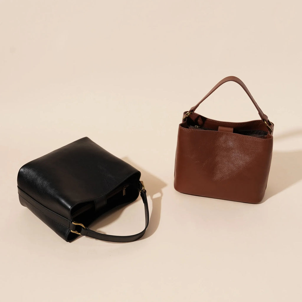 Sugar brown genuine cowhide leather women's vintage shoulder handbag showing square shape and single strap.