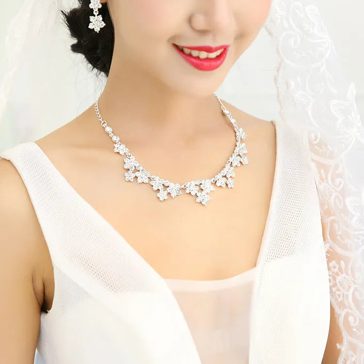 Korean crystal necklace and earring bridal set with crystal detailing on metal base