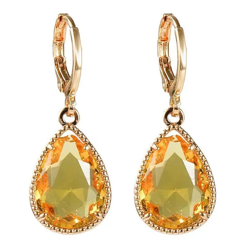 Geometric glass water drop earrings with carved Saturn design in multiple colours