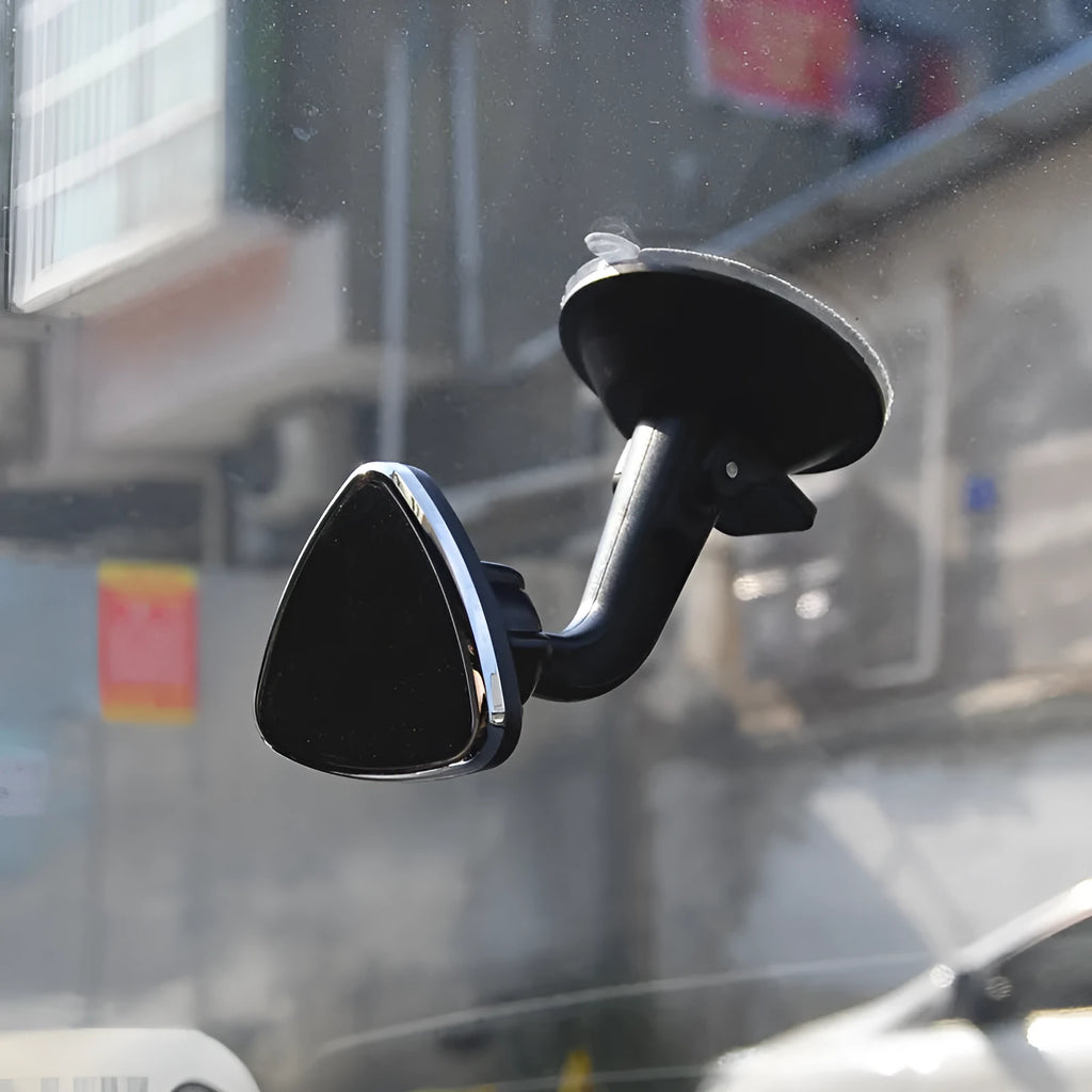 Black magnetic car phone holder with 360 rotation for dashboard mounting with iPhone and Samsung compatibility