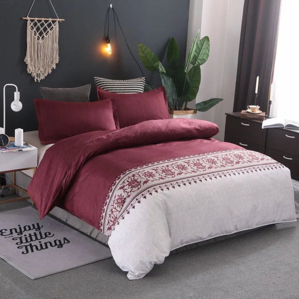 Plain weave polyester duvet cover set in solid colour or floral pattern on a bed
