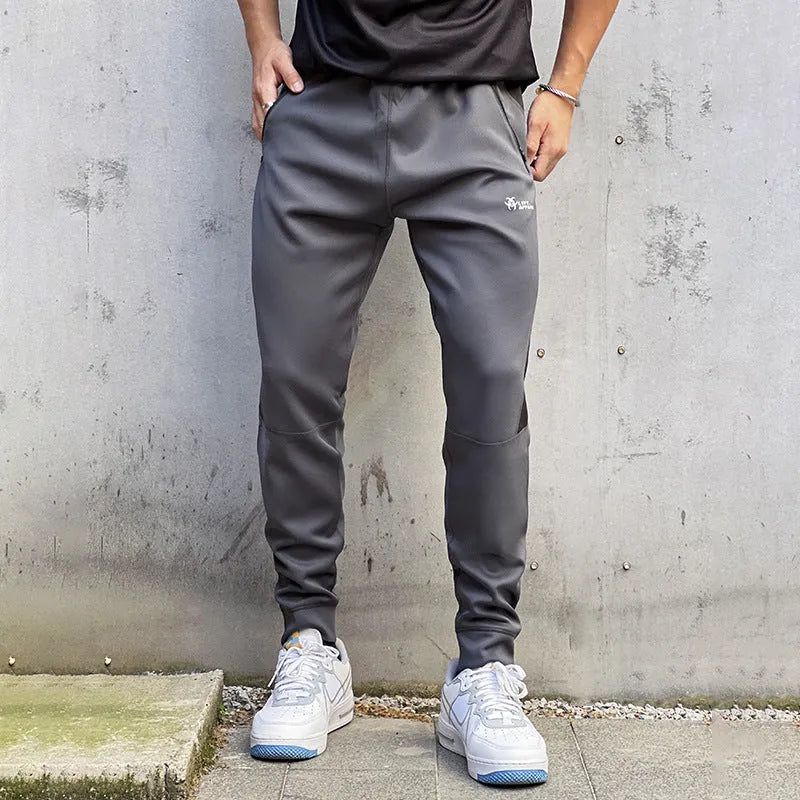 Stretch polyester sweatpants with zip pockets in deep gray, panel design, Asian sizing M-XXL