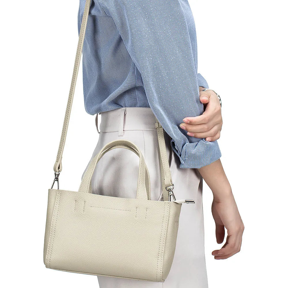 Genuine leather crossbody handbag in horizontal square shape with sandwich pocket, available in multiple colours