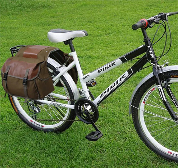 Canvas rear seat storage bag for bicycle or motorcycle in khaki, army green, or black, 27x44x15 cm with zipper pocket