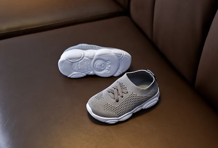 Children's fabric slip-on shoes with non-slip rubber soles in white, black, pink or grey colours