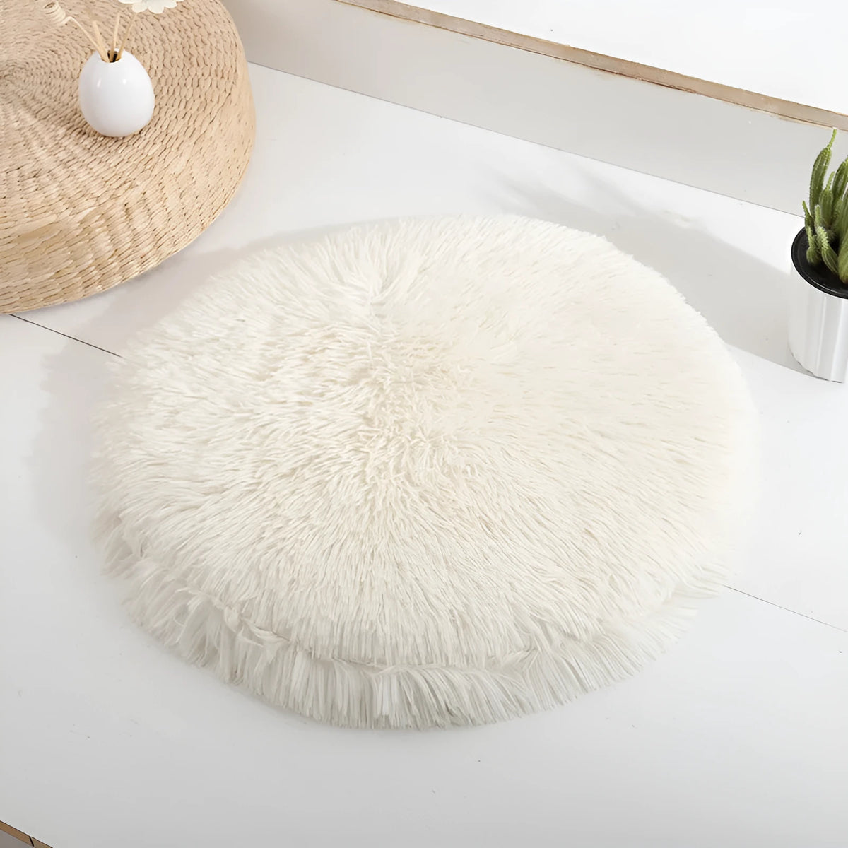 Round plush polyester pet mat for small dogs and cats, available in 40cm, 50cm and 60cm sizes and seven colours