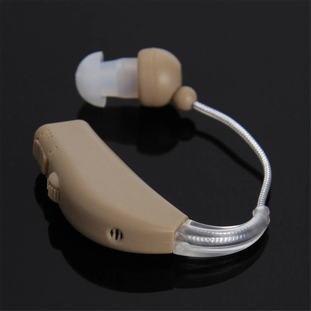 Rechargeable behind-the-ear digital hearing amplifier with mini sound tube and choice of EU or US plug.