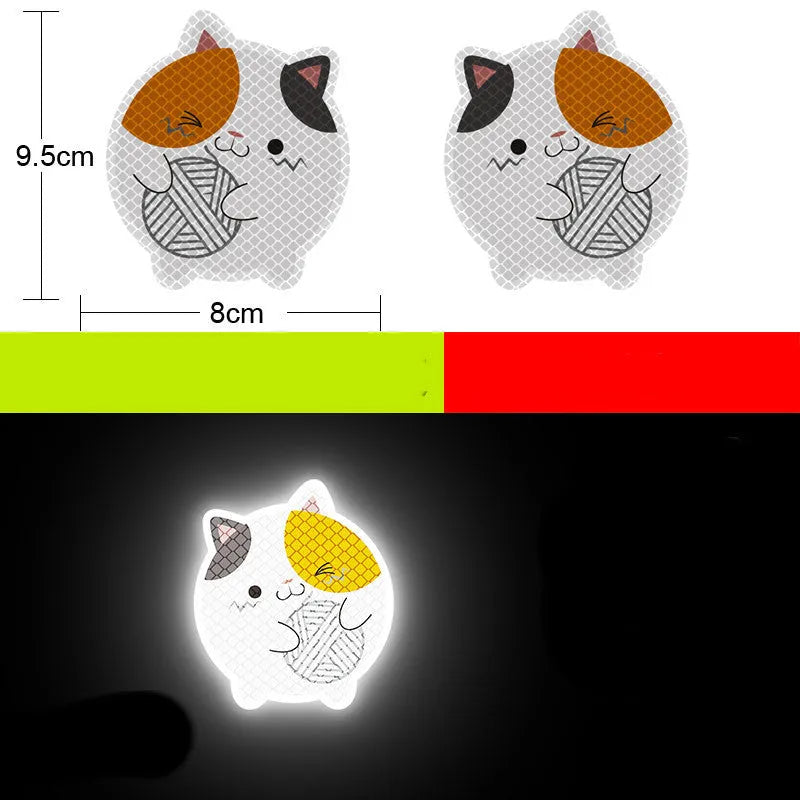 A pair of diamond-grade reflective warning stickers for vehicles, measuring 9 by 5 centimetres, showing one of 22 available graphic designs.