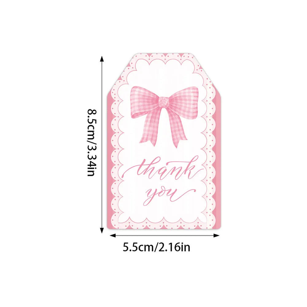Three style variations of creative bowknot gift label tags with hemp rope attachments