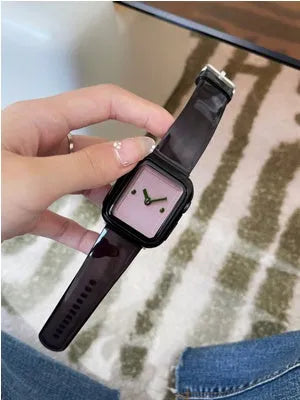Brown transparent silicone Apple Watch strap showing clear construction and band attachment mechanism