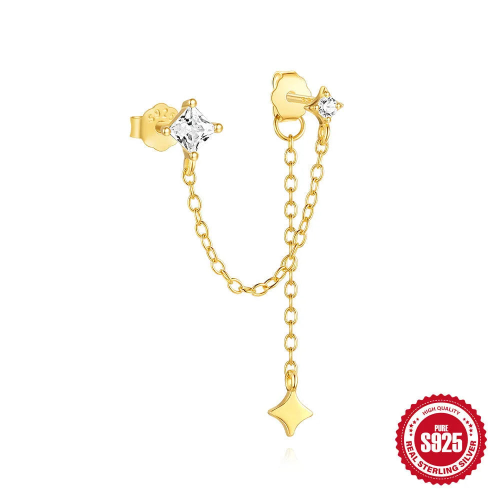 S925 sterling silver stud earring with golden double piercing design and zircon inlaid detail on a white background.