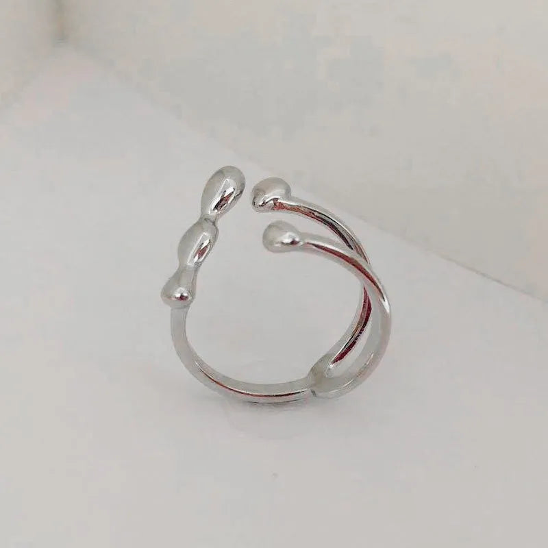 Brass women's fashion ring with spherical design in gold or silver colour