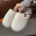 Solid colour winter plush slippers with PVC upper and car stitching, non-slip sole, unisex house footwear