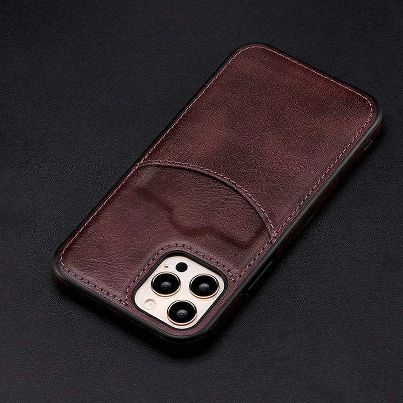 Dark blue PU leather protective case for various iPhone models on a table