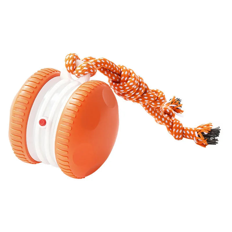 Rechargeable ABS rolling ball pet toy in orange colour on a light floor