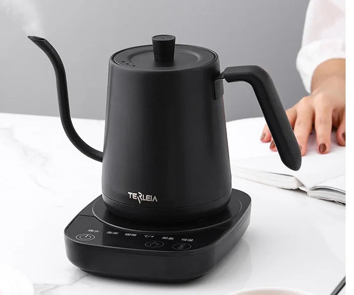 Black stainless steel slender mouth touch control electric kettle with inner scale marking on a desk